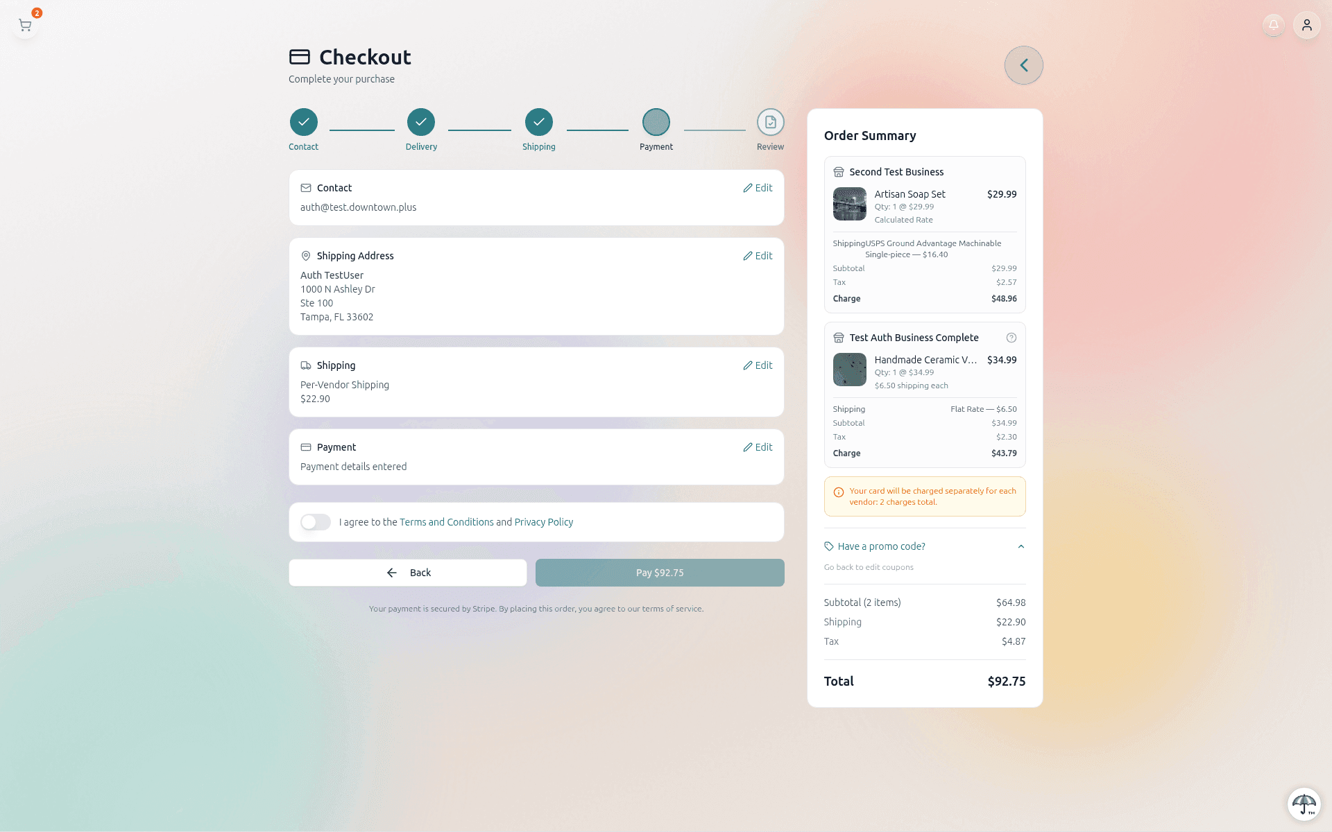 Checkout review step showing contact, shipping address, payment summary, and order total with subtotal, shipping, and tax lines