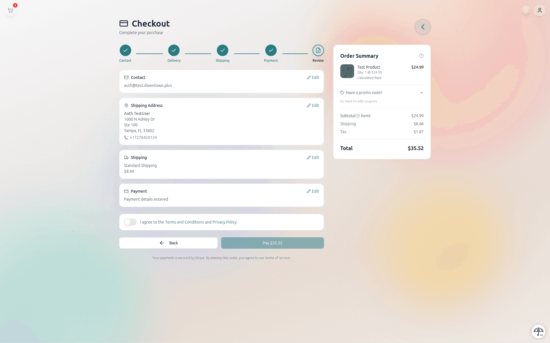 Checkout review page showing order summary with subtotal, shipping, and a calculated Tax line of $1.87 before the total